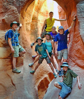 Venture crew in a Utah slot canyon; Jeff Marion on left.